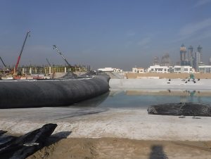 aquadam water barrier being used on construction site