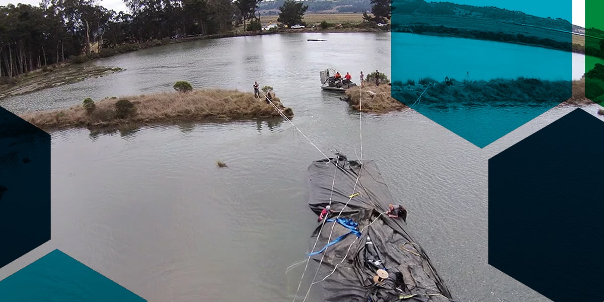 Setting up a cofferdam to help with environmental flooding for environmental remediation